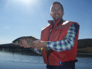 Leroy with a wild trout from Four Springs Lake Tasmania