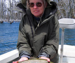 Audrey holding a wild Tasmanian trout