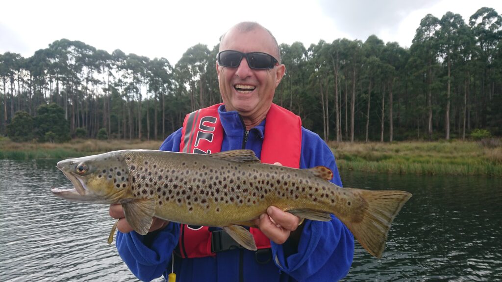 Ed with wild brown trout on Four Springs Lake