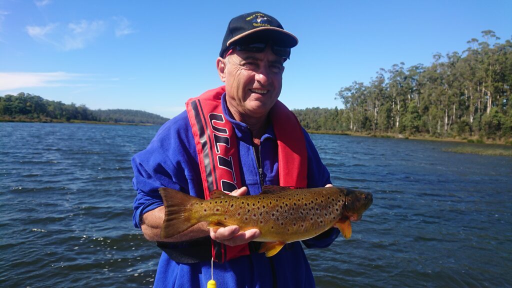 Ed with wild brown trout on Four Springs Lake,