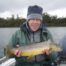 John holding a fine brown trout