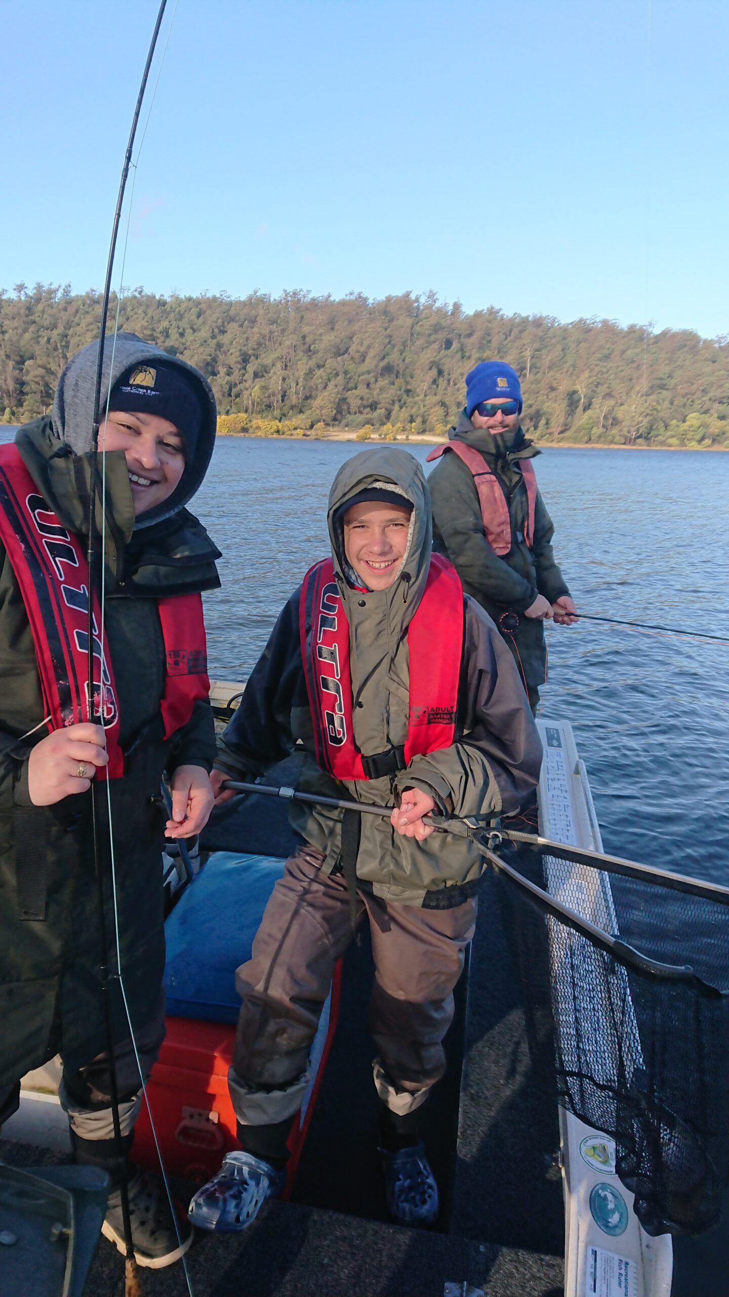 Family enjoying a guided fishing tour