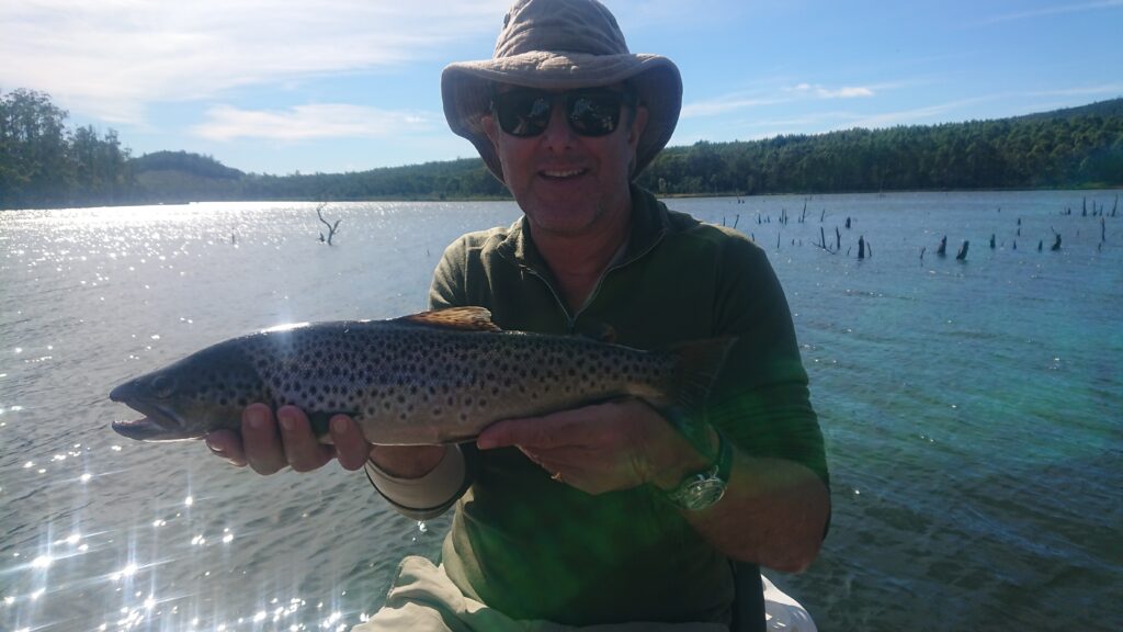 Mark with wild brown trout caught at Four Springs Tasmania