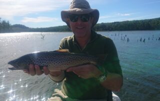 Mark with wild brown trout caught at Four Springs Tasmania