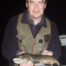 Mark holding a brown trout