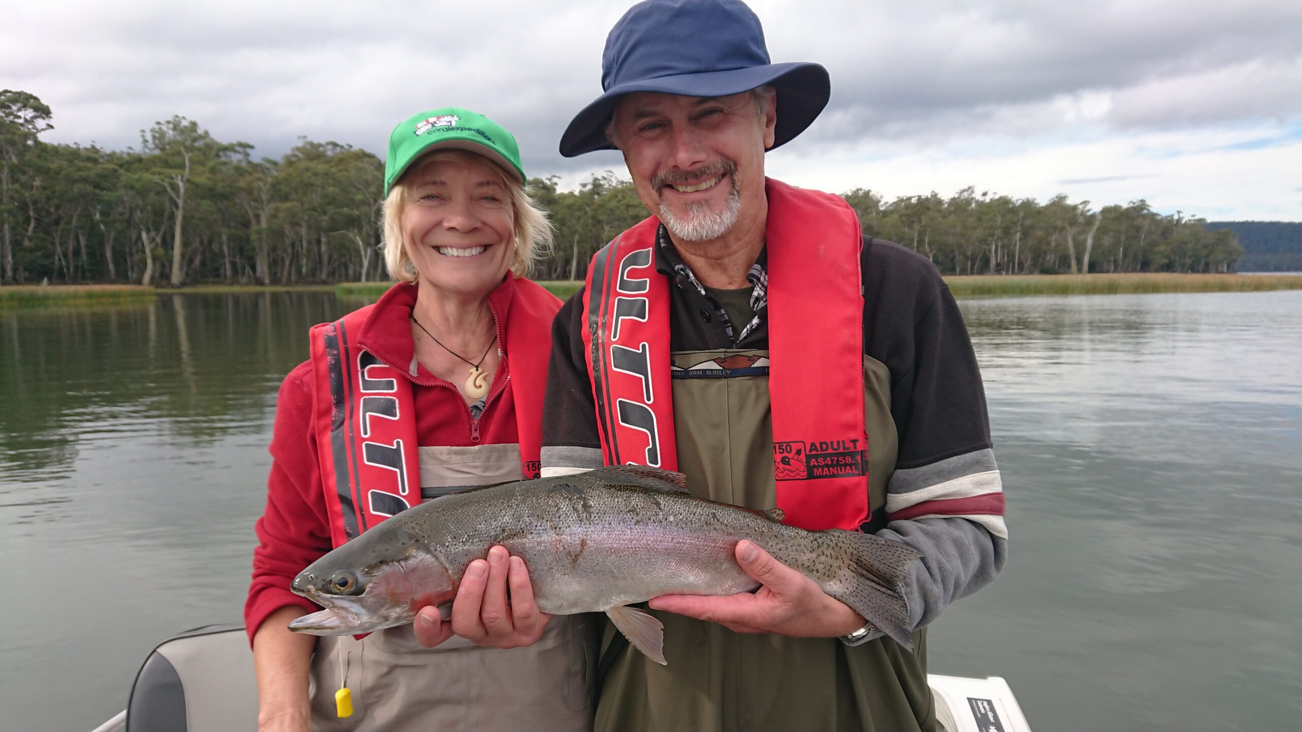 Mike and Bev with a rainbow trout caught at Lake Leake