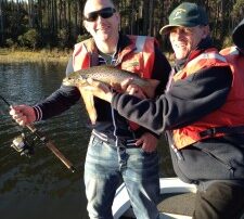 Nicholas and guide Gary France with a Four Springs trout